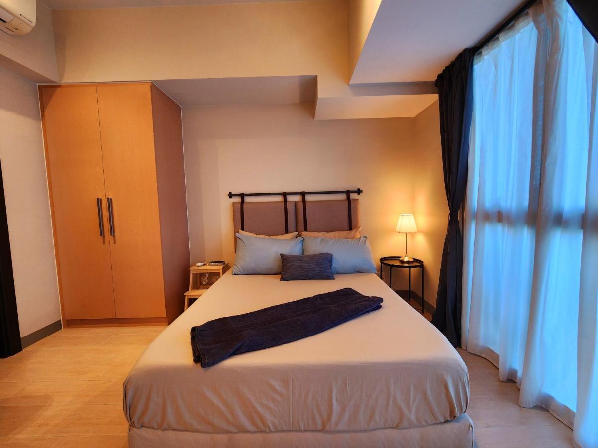 Spacious 7U Homey Unit Steps Away From Uptown Mall And Mitsukoshi Mall Free Parking With Washer มะนิลา ภายนอก รูปภาพ
